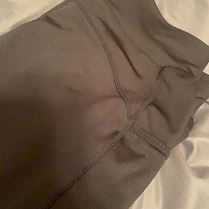 Pop fit leggings! Black! Pockets! Cute black cross on the bottom! Never worn!